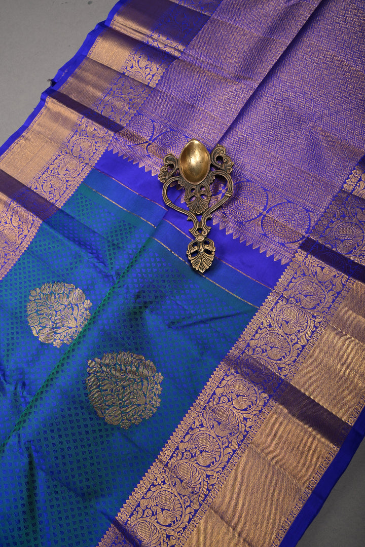 Blue-Green Dual Tone Self Brocade on Pure Kanjivaram Silk Handloom Saree with Zari Buttas and Zari Border| SILK MARK CERTIFIED | SHOBITAM