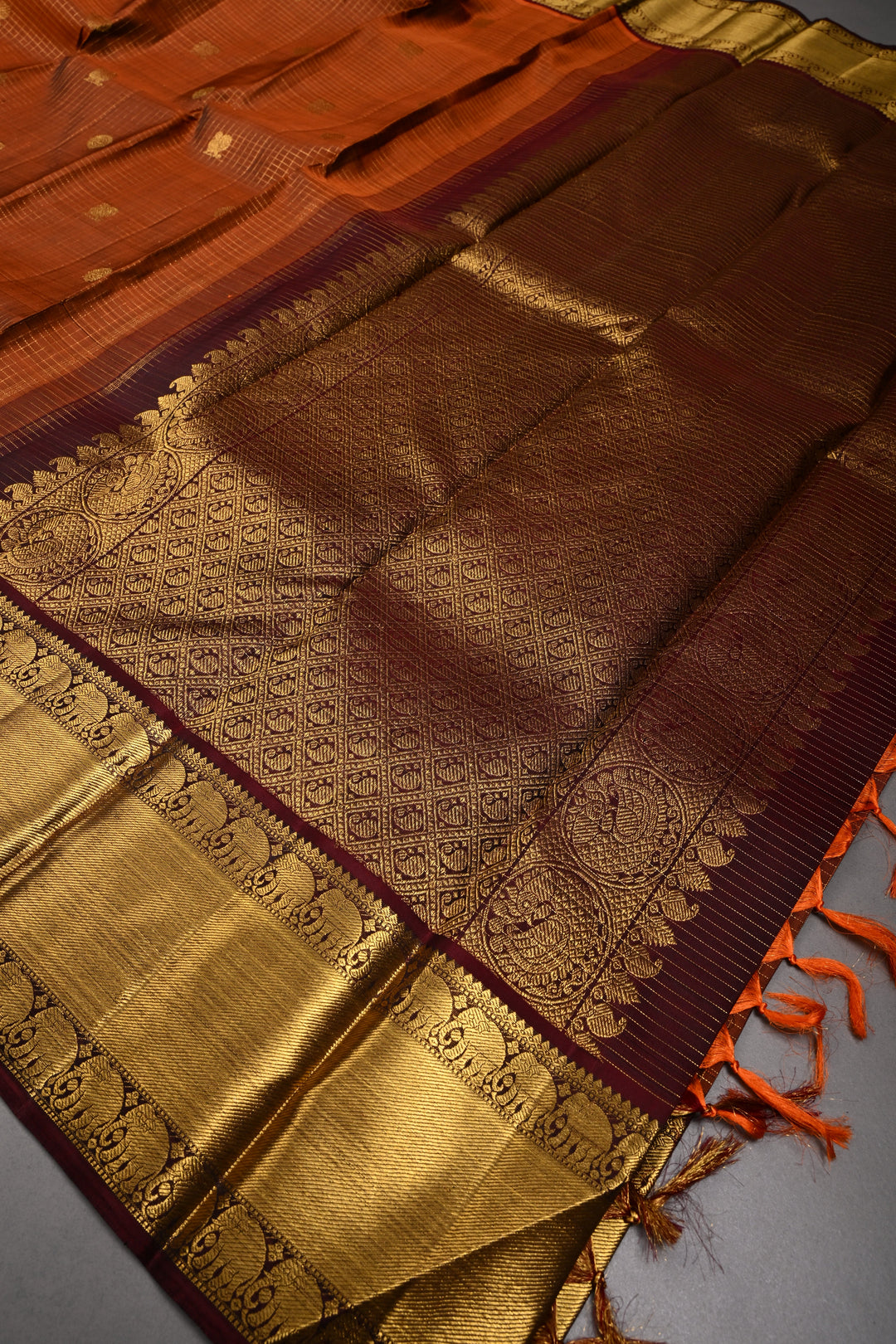 Pre-order Rust Orange Zari Buttas on Kanjivaram Pure Silk Saree with Podi-Kattam Zari Checks and Contrast Zari Border | SILK MARK CERTIFIED | SHOBITAM