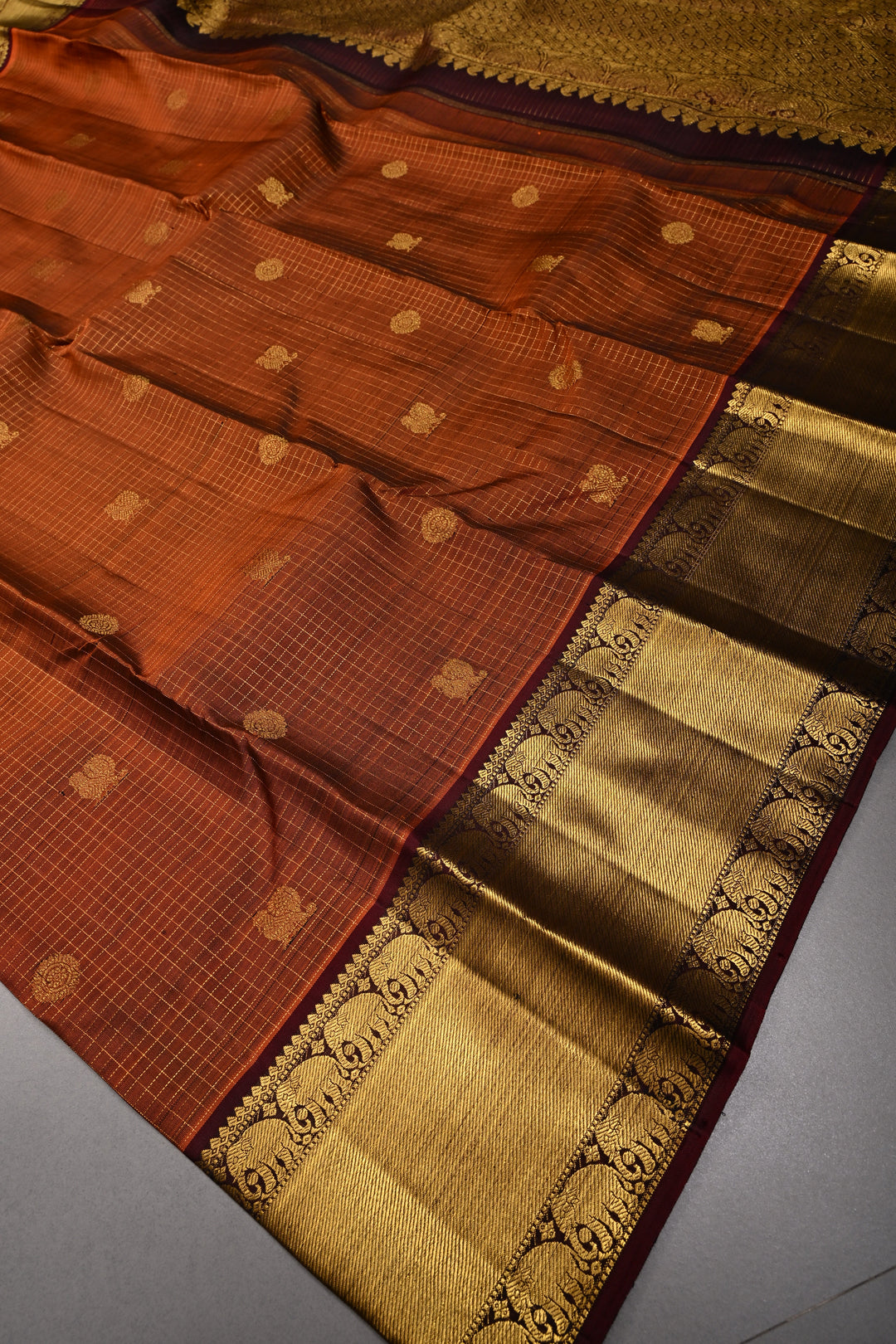 Pre-order Rust Orange Zari Buttas on Kanjivaram Pure Silk Saree with Podi-Kattam Zari Checks and Contrast Zari Border | SILK MARK CERTIFIED | SHOBITAM