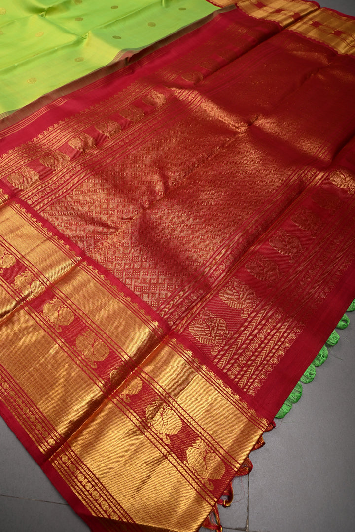 Parrot Green korvai Kanjivaram Pure Silk Saree with Zari Buttas and Contrast Zari Border | SILK MARK CERTIFIED | SHOBITAM