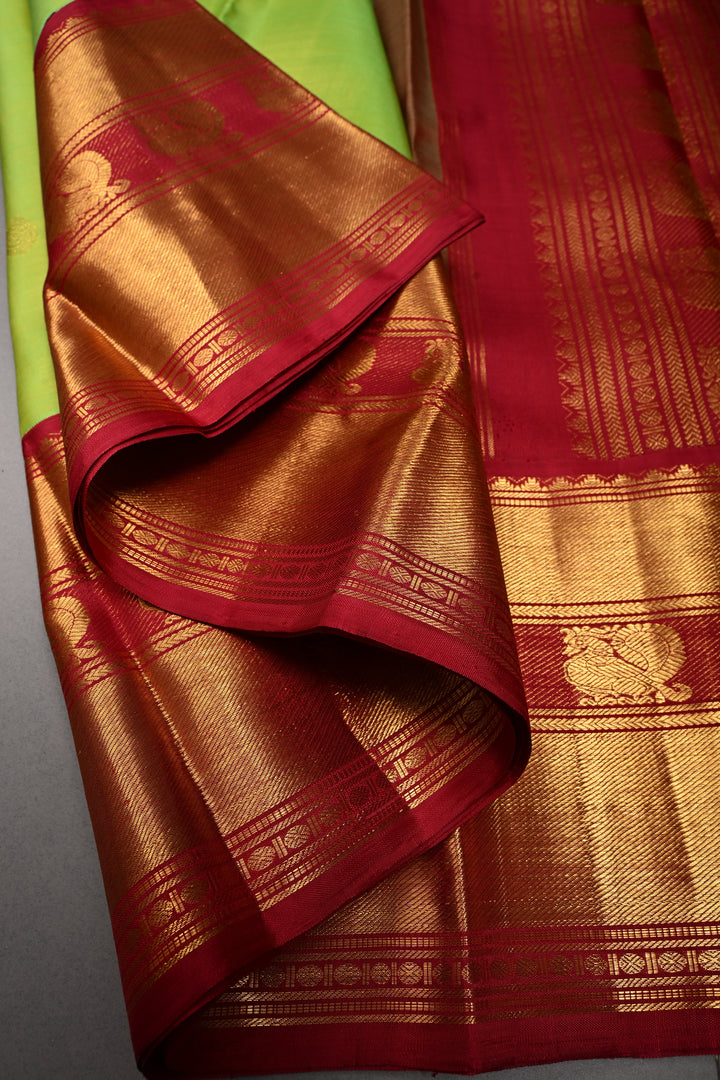 Parrot Green korvai Kanjivaram Pure Silk Saree with Zari Buttas and Contrast Zari Border | SILK MARK CERTIFIED | SHOBITAM