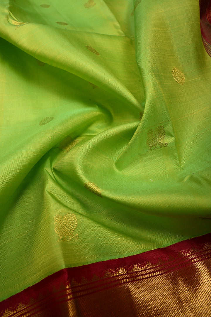 Parrot Green korvai Kanjivaram Pure Silk Saree with Zari Buttas and Contrast Zari Border | SILK MARK CERTIFIED | SHOBITAM