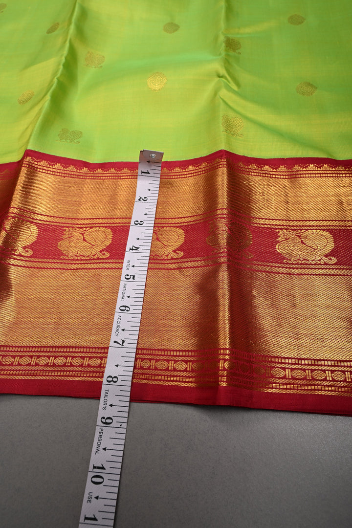 Parrot Green korvai Kanjivaram Pure Silk Saree with Zari Buttas and Contrast Zari Border | SILK MARK CERTIFIED | SHOBITAM