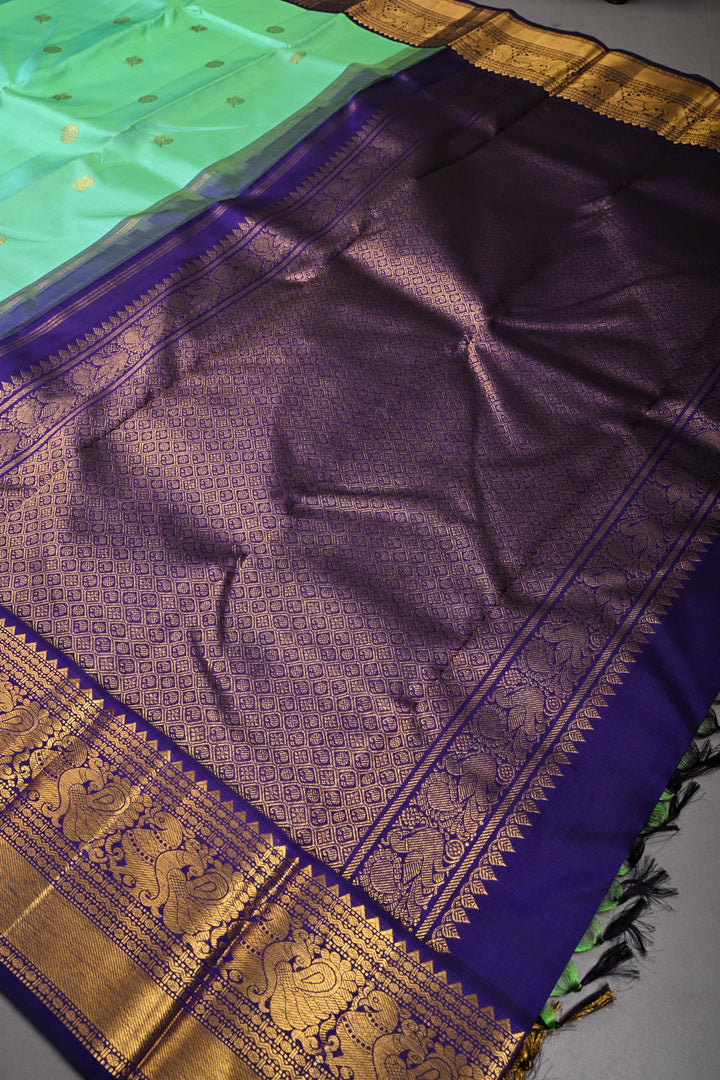 Sea Green Dual tone Korvai Kanjivaram Pure Silk Saree with Zari Buttas and Contrast Zari Border | SILK MARK CERTIFIED | SHOBITAM