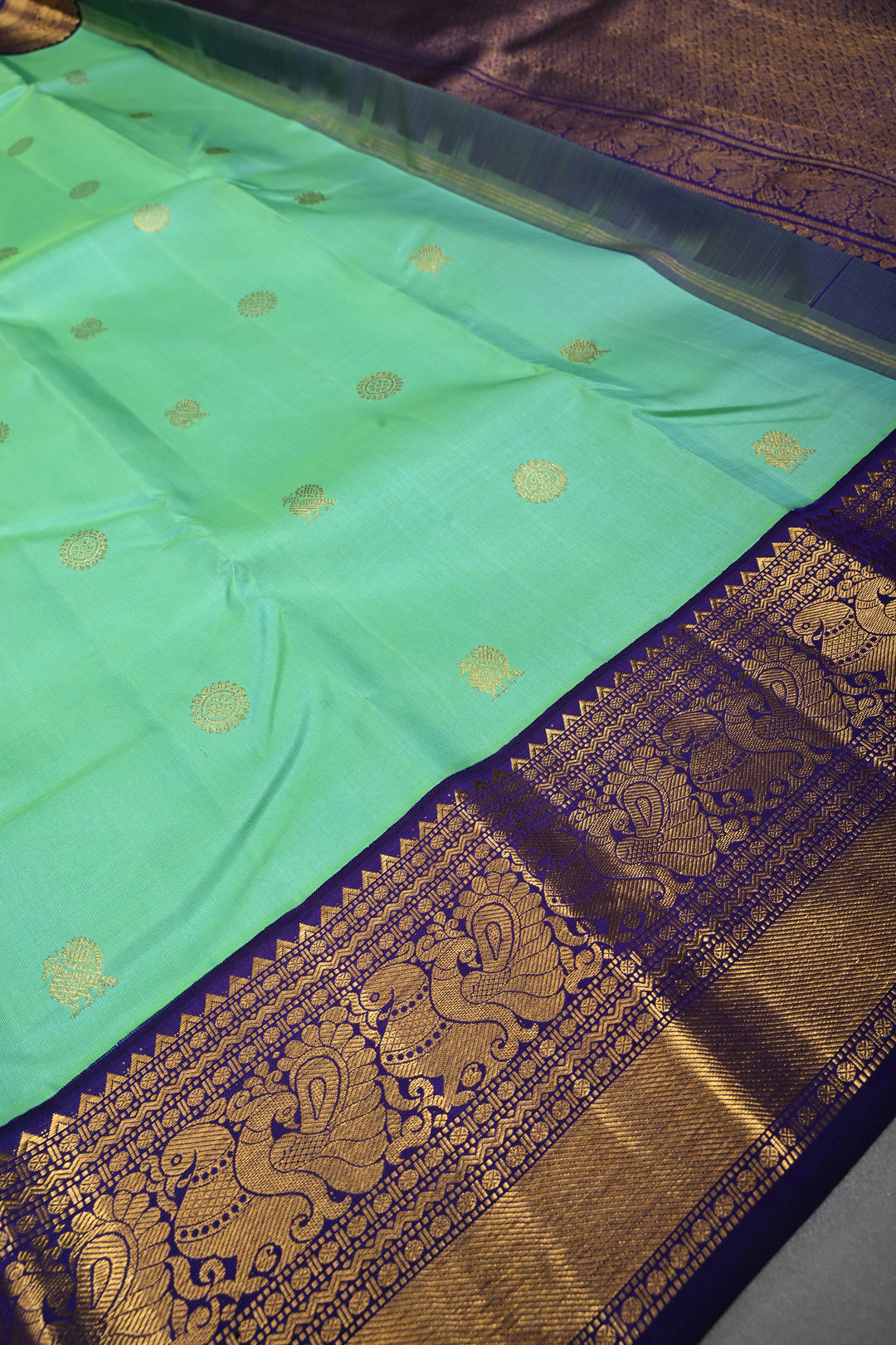 Sea Green Dual tone Korvai Kanjivaram Pure Silk Saree with Zari Buttas and Contrast Zari Border | SILK MARK CERTIFIED | SHOBITAM