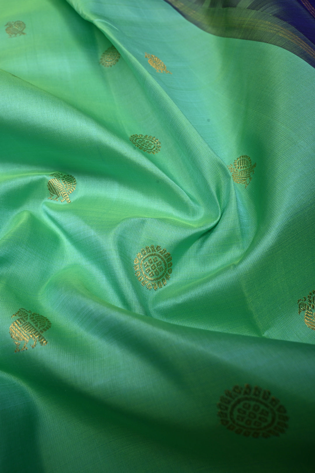 Sea Green Dual tone Korvai Kanjivaram Pure Silk Saree with Zari Buttas and Contrast Zari Border | SILK MARK CERTIFIED | SHOBITAM