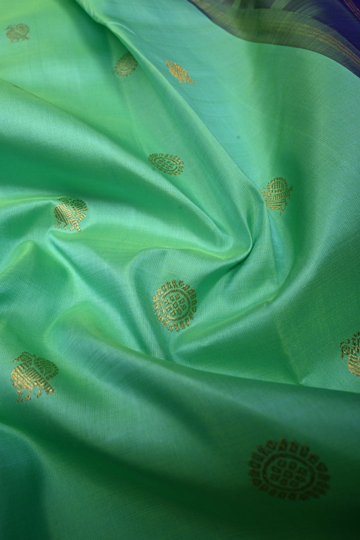 Sea Green Dual tone Korvai Kanjivaram Pure Silk Saree with Zari Buttas and Contrast Zari Border | SILK MARK CERTIFIED | SHOBITAM