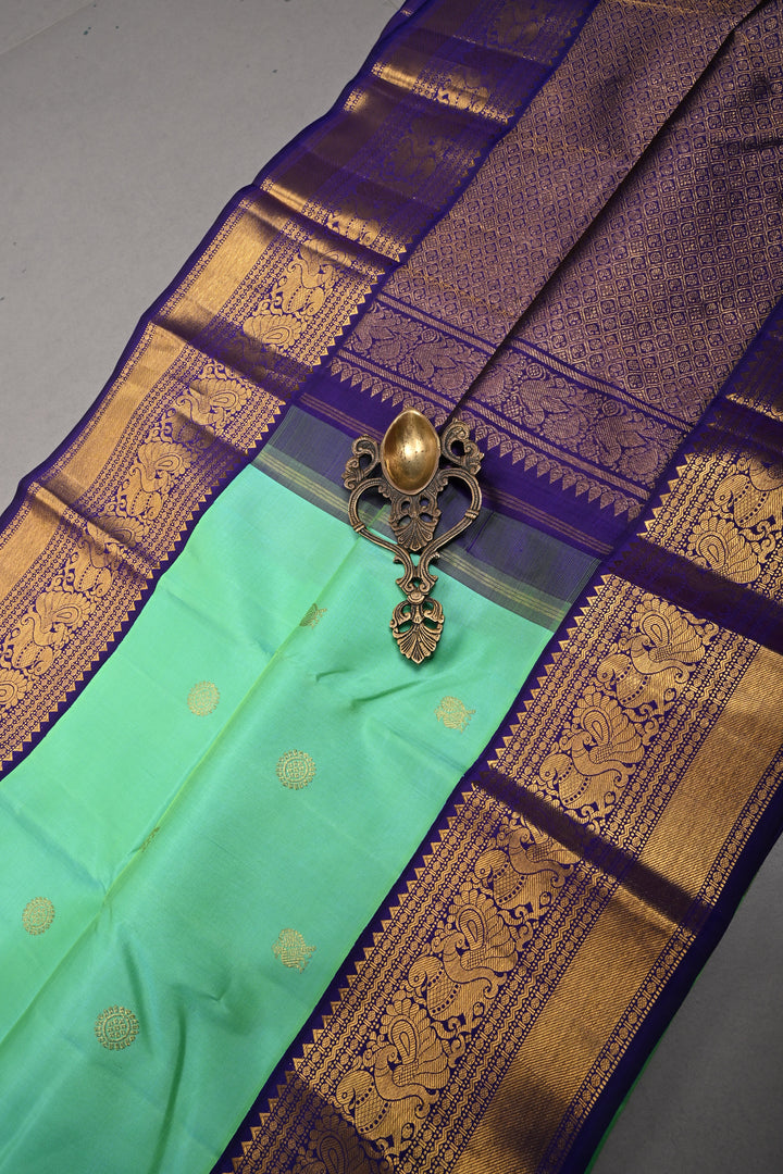 Sea Green Dual tone Korvai Kanjivaram Pure Silk Saree with Zari Buttas and Contrast Zari Border | SILK MARK CERTIFIED | SHOBITAM
