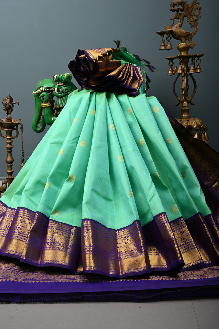 Sea Green Dual tone Korvai Kanjivaram Pure Silk Saree with Zari Buttas and Contrast Zari Border | SILK MARK CERTIFIED | SHOBITAM