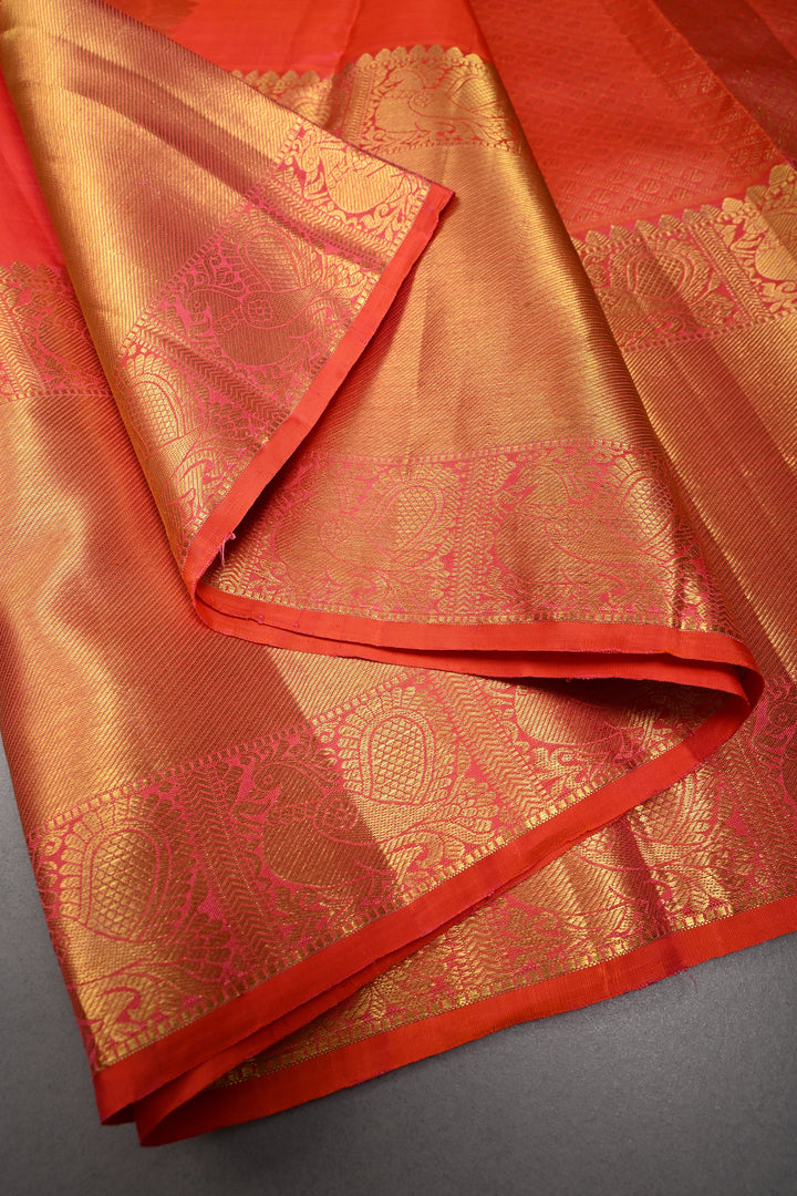 Coral Red Dual tone Kanjivaram Silk Saree with Leaf Zari Buttas and Wide Zari Border | SILK MARK CERTIFIED