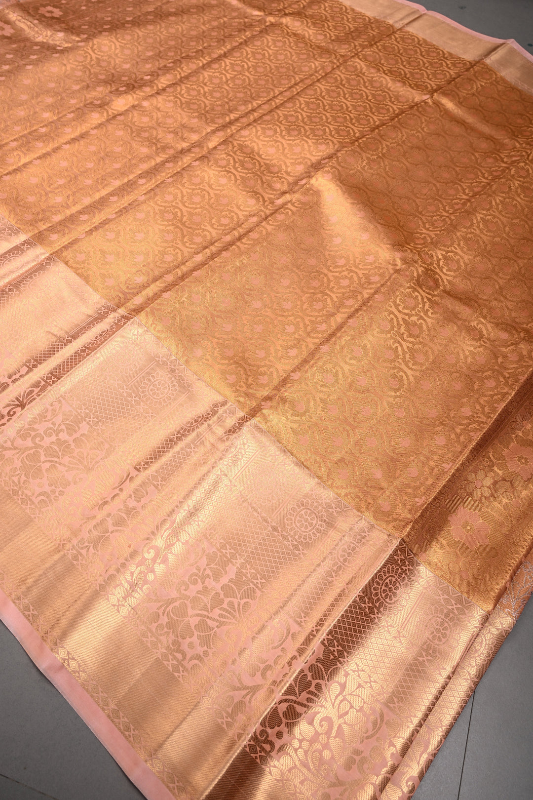 Peach Kanjivaram Tissue Semi Silk Saree with Meenakari Floral Jaal Brocade and Wide Zari Border | SHOBITAM