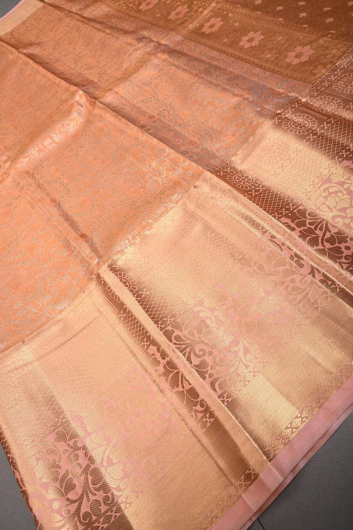 Peach Kanjivaram Tissue Semi Silk Saree with Meenakari Floral Jaal Brocade and Wide Zari Border | SHOBITAM