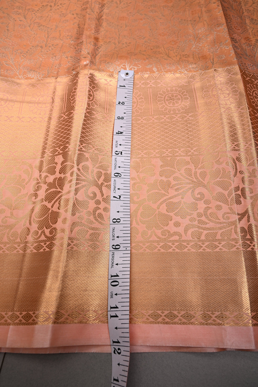 Peach Kanjivaram Tissue Semi Silk Saree with Meenakari Floral Jaal Brocade and Wide Zari Border | SHOBITAM