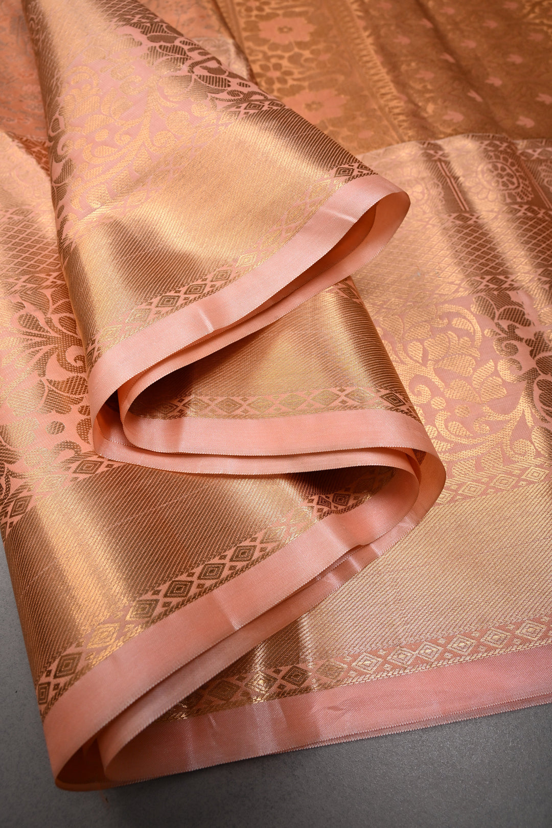 Peach Kanjivaram Tissue Semi Silk Saree with Meenakari Floral Jaal Brocade and Wide Zari Border | SHOBITAM
