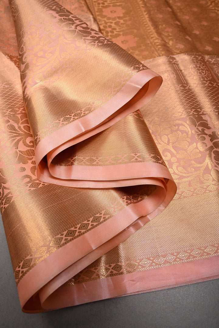 Peach Kanjivaram Tissue Semi Silk Saree with Meenakari Floral Jaal Brocade and Wide Zari Border | SHOBITAM