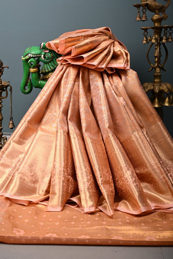 Peach Kanjivaram Tissue Semi Silk Saree with Meenakari Floral Jaal Brocade and Wide Zari Border | SHOBITAM
