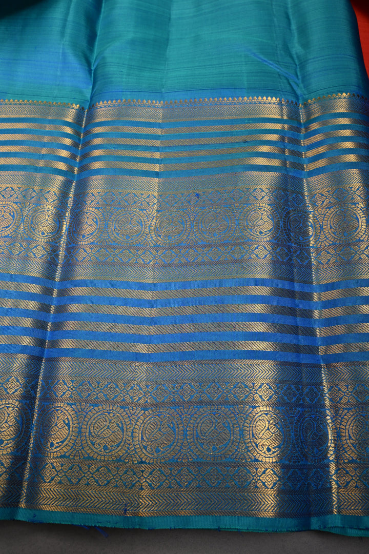 Coral Orange Kanjivaram Silk Saree with Peacock Medallion Zari Buttas and Zari Stripes Border | SILK MARK CERTIFIED