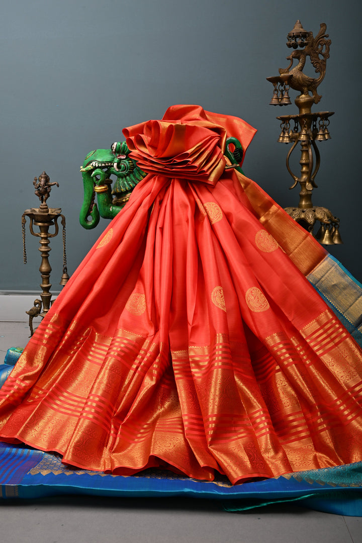 Coral Orange Kanjivaram Silk Saree with Peacock Medallion Zari Buttas and Zari Stripes Border | SILK MARK CERTIFIED