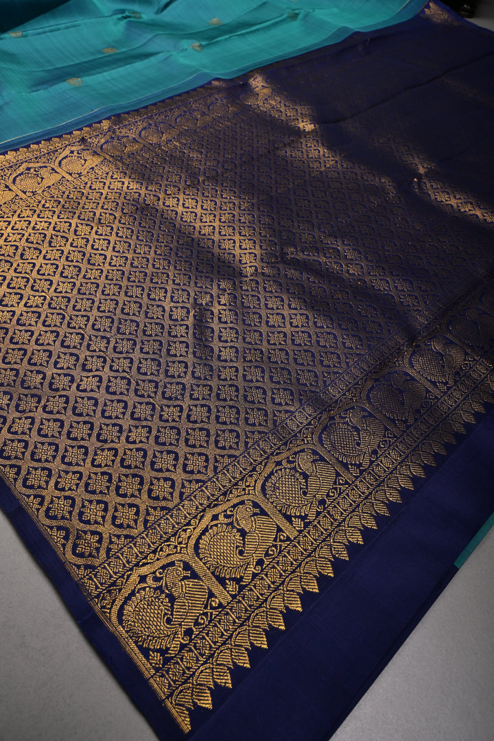 Aegean Blue Kanjivaram Pure Silk Saree with Zari Buttas and One Side Distinct Vanasingaram Mandala Motifs on Border | SILK MARK CERTIFIED | SHOBITAM