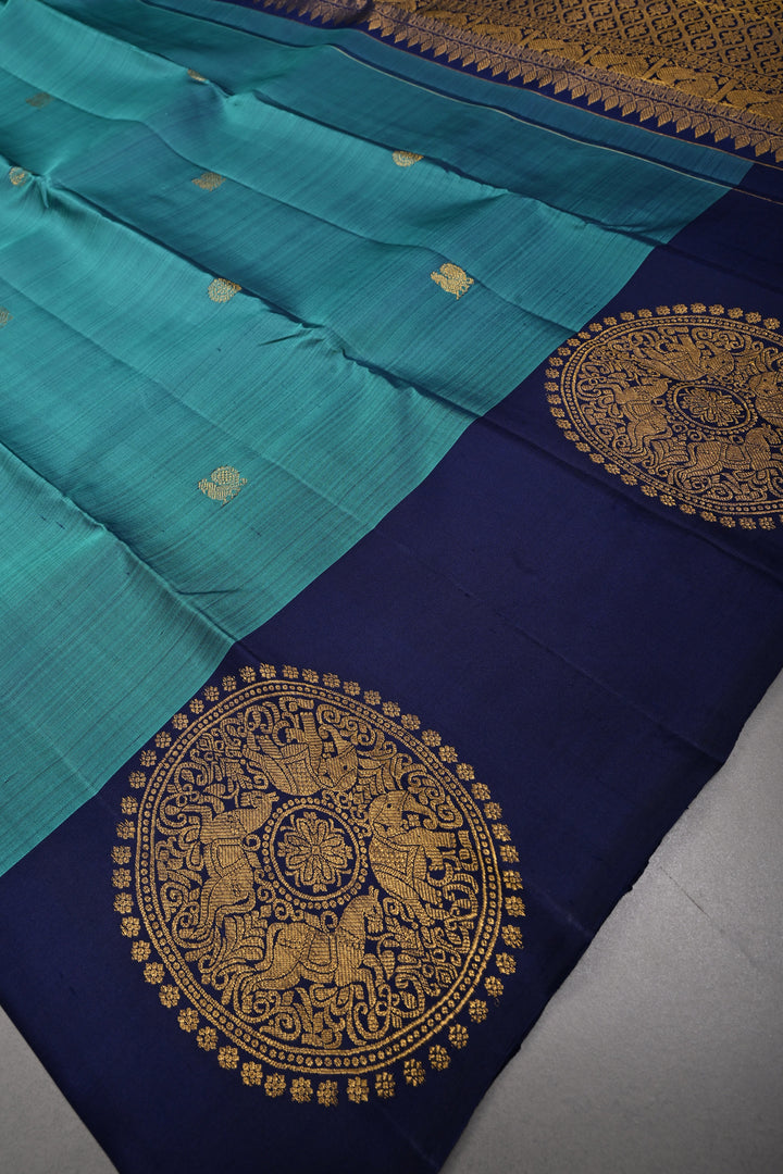 Aegean Blue Kanjivaram Pure Silk Saree with Zari Buttas and One Side Distinct Vanasingaram Mandala Motifs on Border | SILK MARK CERTIFIED | SHOBITAM