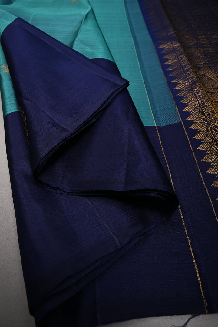 Aegean Blue Kanjivaram Pure Silk Saree with Zari Buttas and One Side Distinct Vanasingaram Mandala Motifs on Border | SILK MARK CERTIFIED | SHOBITAM