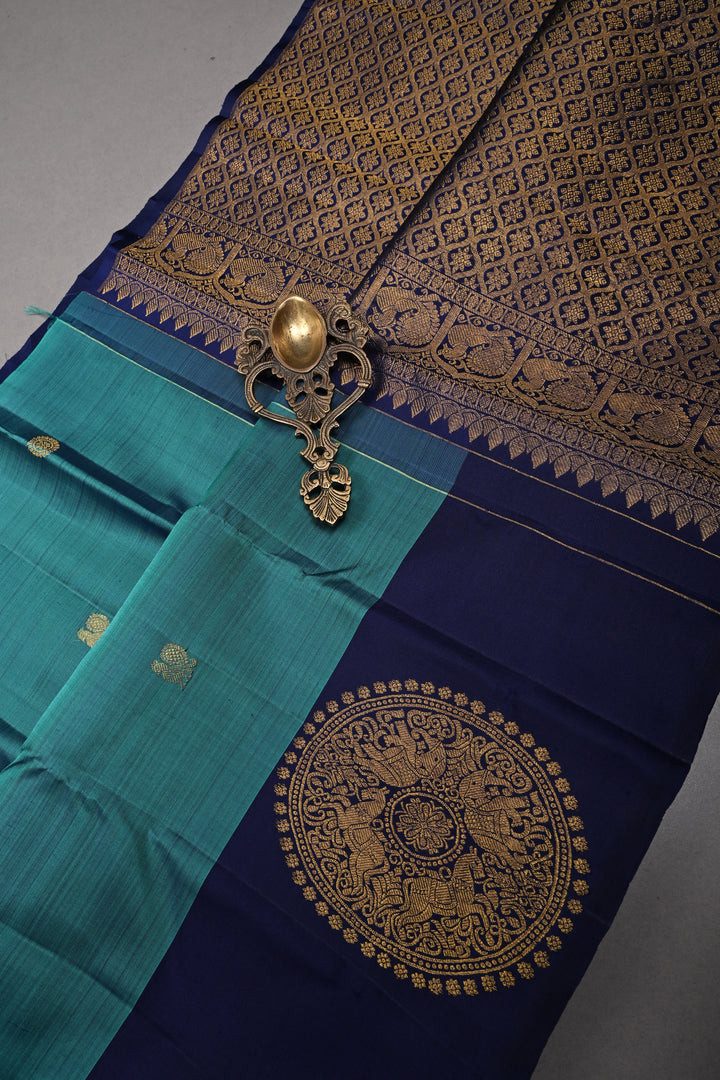 Aegean Blue Kanjivaram Pure Silk Saree with Zari Buttas and One Side Distinct Vanasingaram Mandala Motifs on Border | SILK MARK CERTIFIED | SHOBITAM