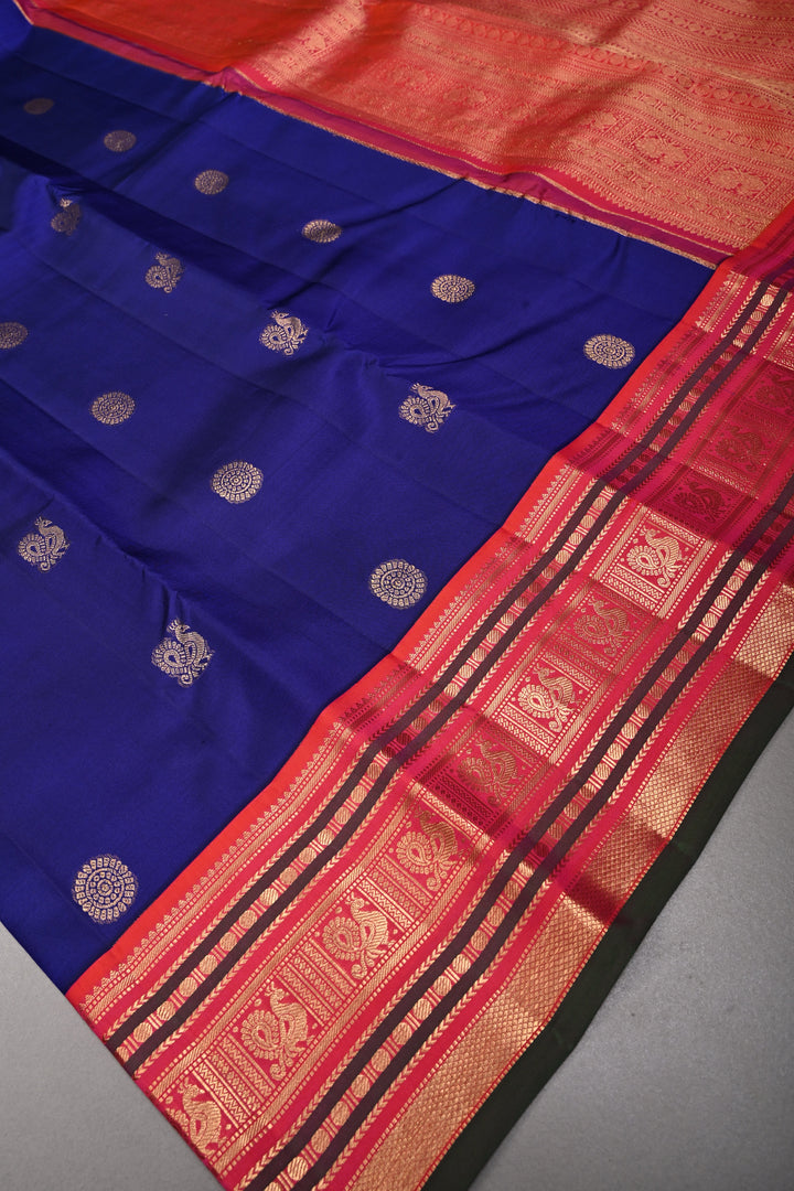 Korvai Deep Blue Kanjivaram Pure Silk Saree with Zari Buttas and Contrast Zari Border | SILK MARK CERTIFIED | SHOBITAM