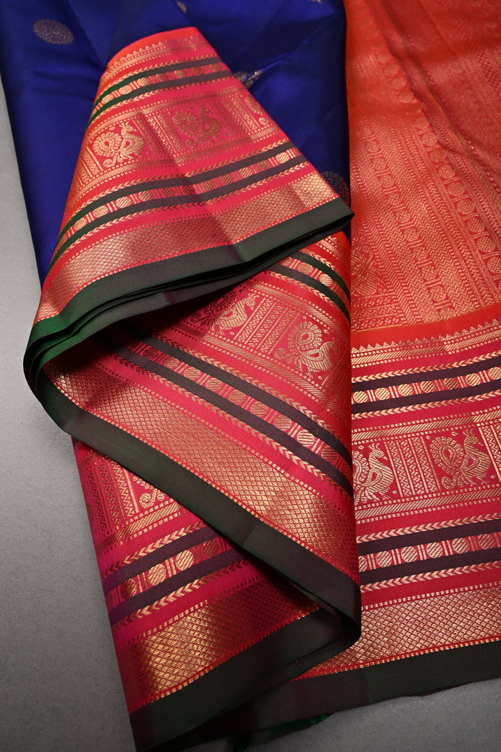 Korvai Deep Blue Kanjivaram Pure Silk Saree with Zari Buttas and Contrast Zari Border | SILK MARK CERTIFIED | SHOBITAM