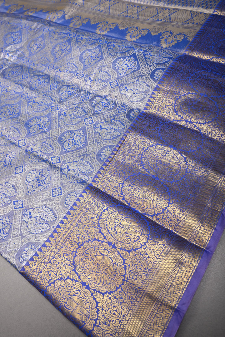 Light Blue Kanjivaram Tissue Semi Silk Saree with Meenakari Floral Brocade and Zari Border | SHOBITAM
