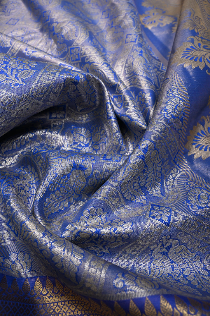 Light Blue Kanjivaram Tissue Semi Silk Saree with Meenakari Floral Brocade and Zari Border | SHOBITAM