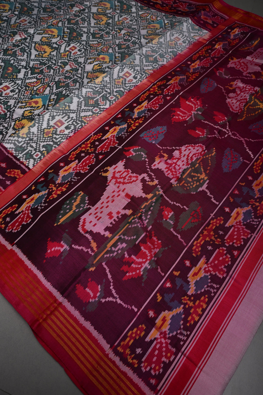 Authentic Patan Patola Pure Silk Handwoven Single Ikkat saree in Ivory with Intricate motifs and contrast borders | SILK MARK CERTIFIED | SHOBITAM