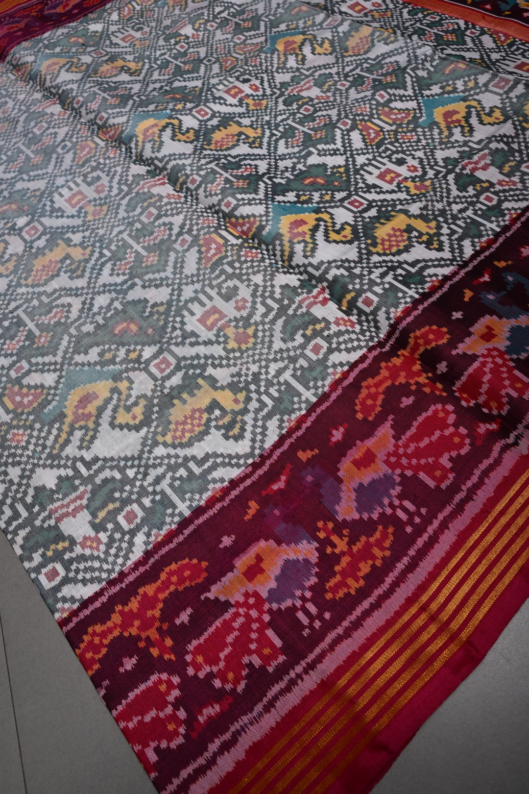 Authentic Patan Patola Pure Silk Handwoven Single Ikkat saree in Ivory with Intricate motifs and contrast borders | SILK MARK CERTIFIED | SHOBITAM
