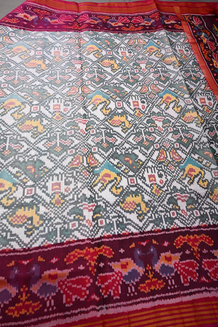 Authentic Patan Patola Pure Silk Handwoven Single Ikkat saree in Ivory with Intricate motifs and contrast borders | SILK MARK CERTIFIED | SHOBITAM