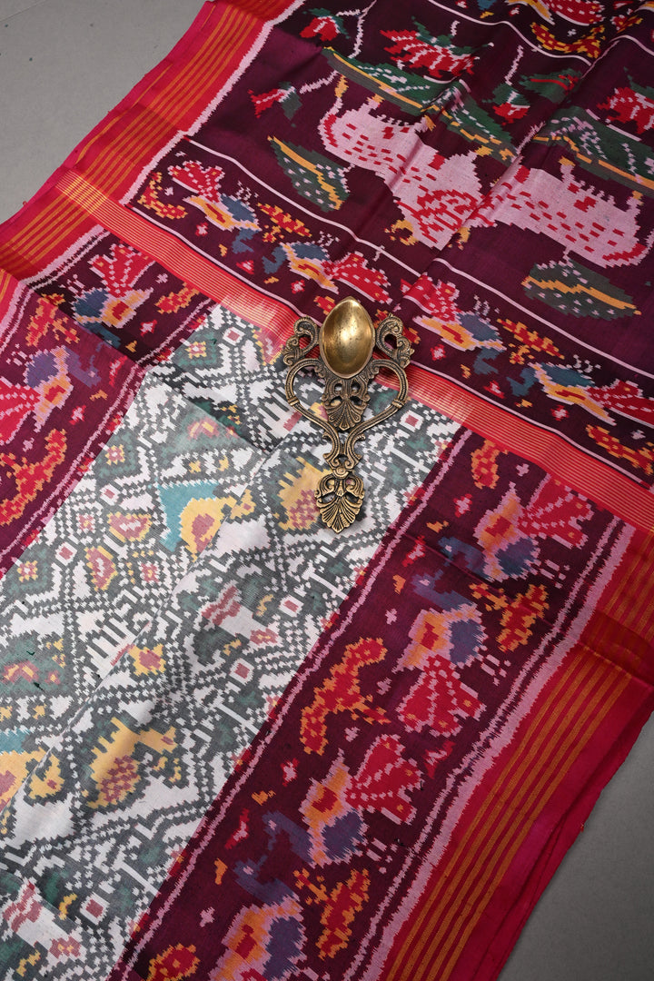 Authentic Patan Patola Pure Silk Handwoven Single Ikkat saree in Ivory with Intricate motifs and contrast borders | SILK MARK CERTIFIED | SHOBITAM