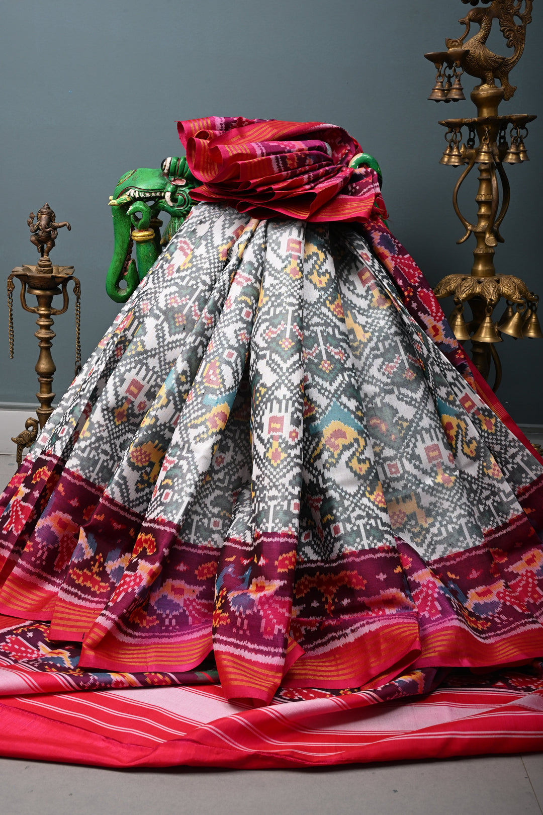 Authentic Patan Patola Pure Silk Handwoven Single Ikkat saree in Ivory with Intricate motifs and contrast borders | SILK MARK CERTIFIED | SHOBITAM