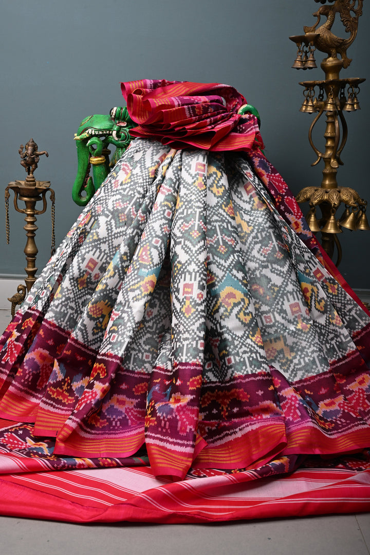 Authentic Patan Patola Pure Silk Handwoven Single Ikkat saree in Ivory with Intricate motifs and contrast borders | SILK MARK CERTIFIED | SHOBITAM