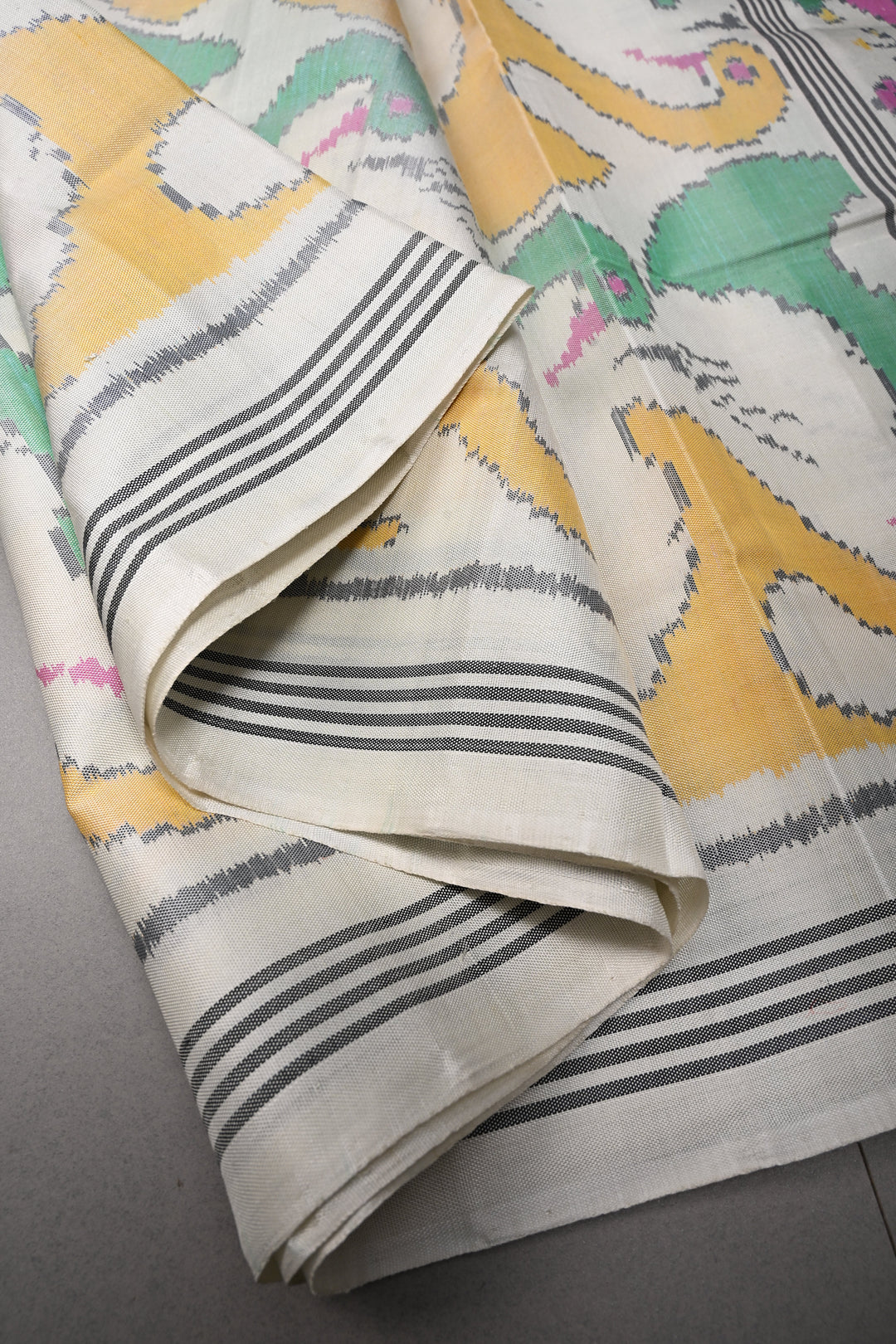 Authentic Patan Patola Single Ikkat Handwoven Pure Silk Saree in Pristine Chalk White with intricate motifs | SILK MARK CERTIFIED | SHOBITAM