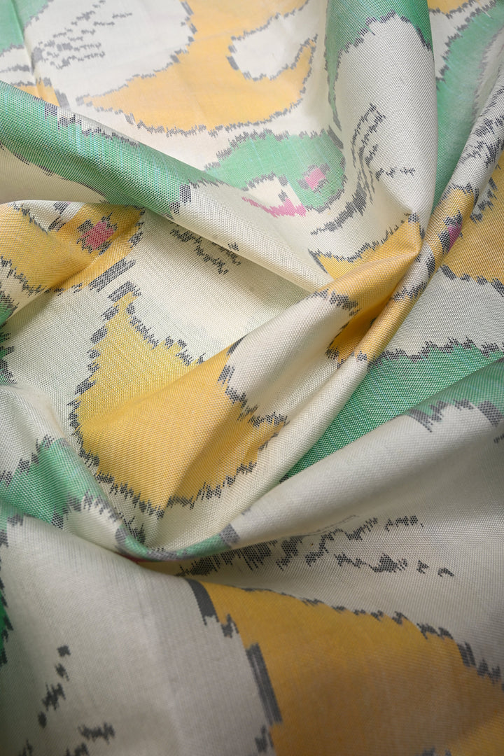 Authentic Patan Patola Single Ikkat Handwoven Pure Silk Saree in Pristine Chalk White with intricate motifs | SILK MARK CERTIFIED | SHOBITAM