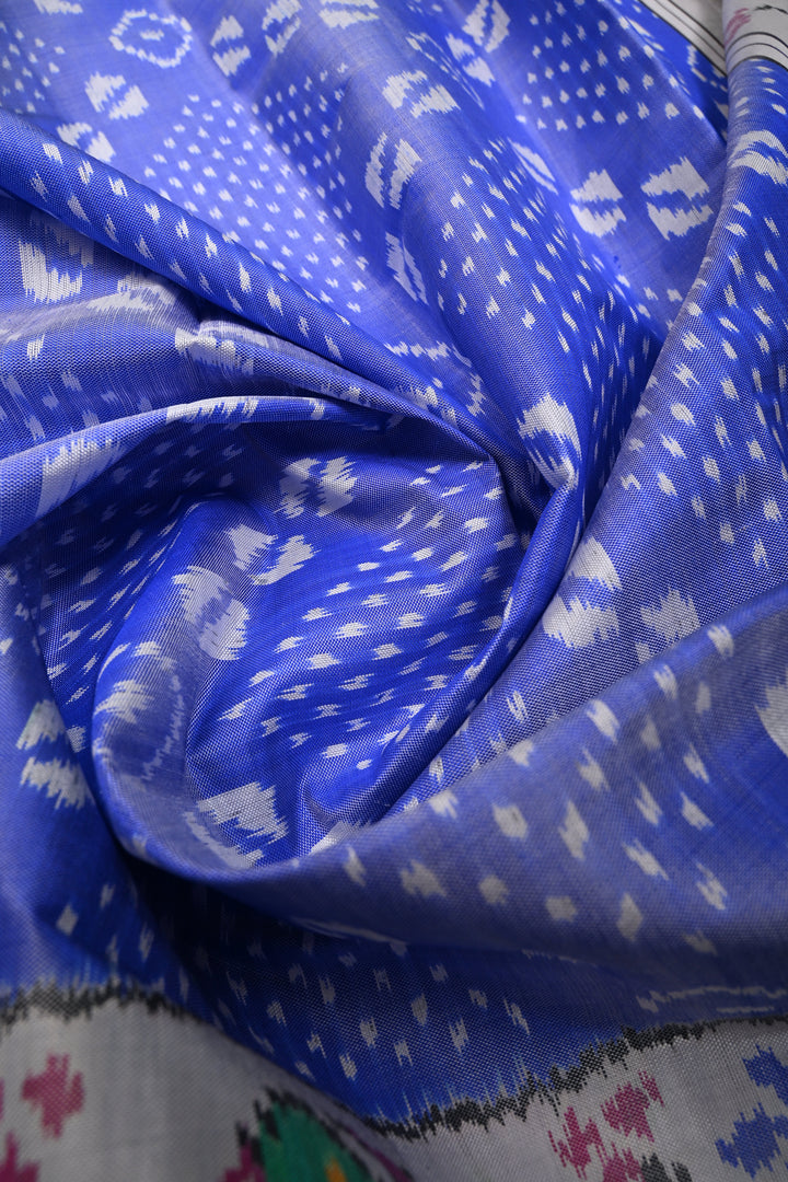 Rare Periwinkle Patan Patola Single Ikkat Pure Silk Handwoven Saree with Bandhini-Cowrie Shells Design and Contrast Border | SILK MARK CERTIFIED | SHOBITAM