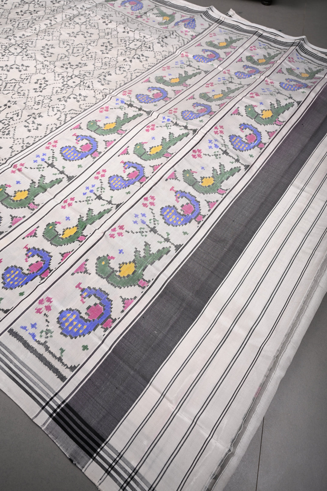 Authentic Patan Patola Single Ikkat Handwoven Pure Silk Saree in Chalk White with intricate geometric motifs | SILK MARK CERTIFIED | SHOBITAM