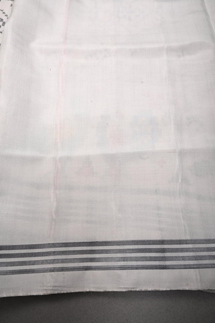 Authentic Patan Patola Single Ikkat Handwoven Pure Silk Saree in Chalk White with intricate geometric motifs | SILK MARK CERTIFIED | SHOBITAM