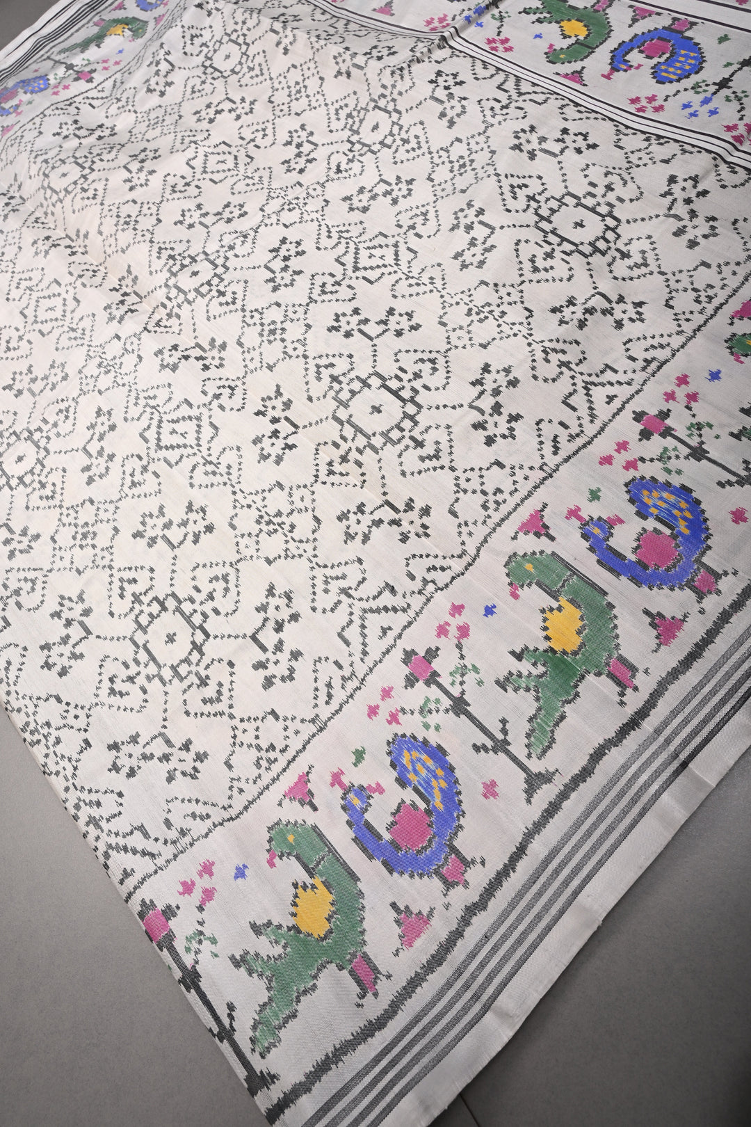 Authentic Patan Patola Single Ikkat Handwoven Pure Silk Saree in Chalk White with intricate geometric motifs | SILK MARK CERTIFIED | SHOBITAM