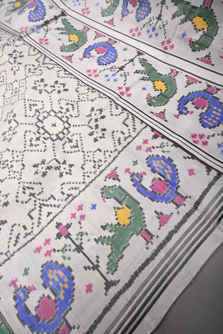 Authentic Patan Patola Single Ikkat Handwoven Pure Silk Saree in Chalk White with intricate geometric motifs | SILK MARK CERTIFIED | SHOBITAM