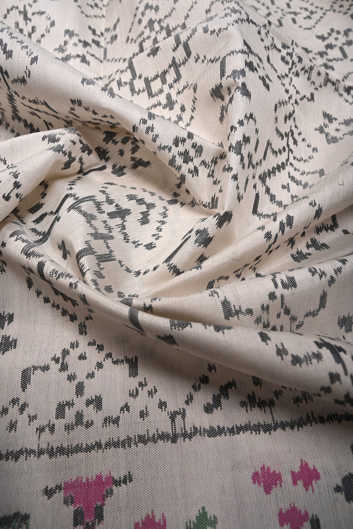 Authentic Patan Patola Single Ikkat Handwoven Pure Silk Saree in Chalk White with intricate geometric motifs | SILK MARK CERTIFIED | SHOBITAM
