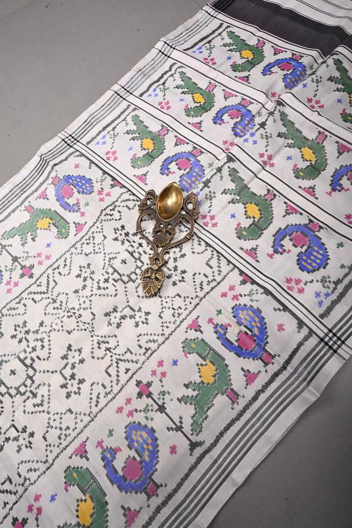 Authentic Patan Patola Single Ikkat Handwoven Pure Silk Saree in Chalk White with intricate geometric motifs | SILK MARK CERTIFIED | SHOBITAM