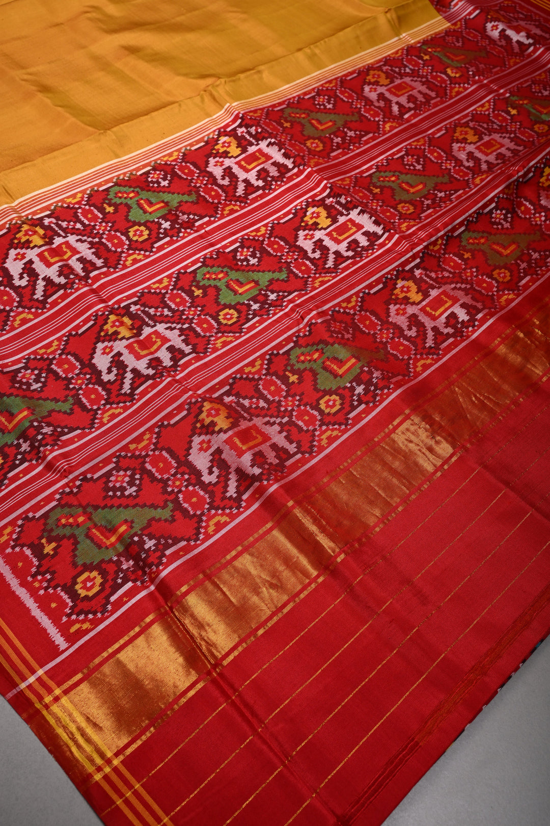 Methi Yellow Authnetic Patan Patola Singlke Ikkat Handwoven Pure Silk Saree with Heritage Borders| SILK MARK CERTIFIED | SHOBITAM