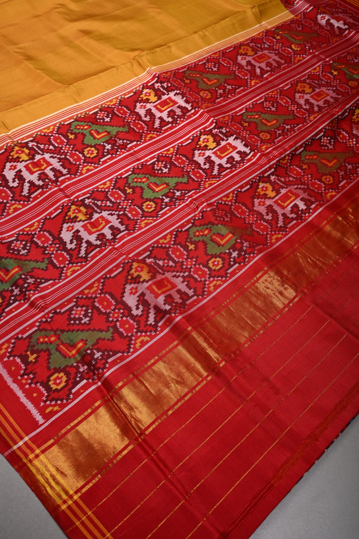 Methi Yellow Authnetic Patan Patola Singlke Ikkat Handwoven Pure Silk Saree with Heritage Borders| SILK MARK CERTIFIED | SHOBITAM