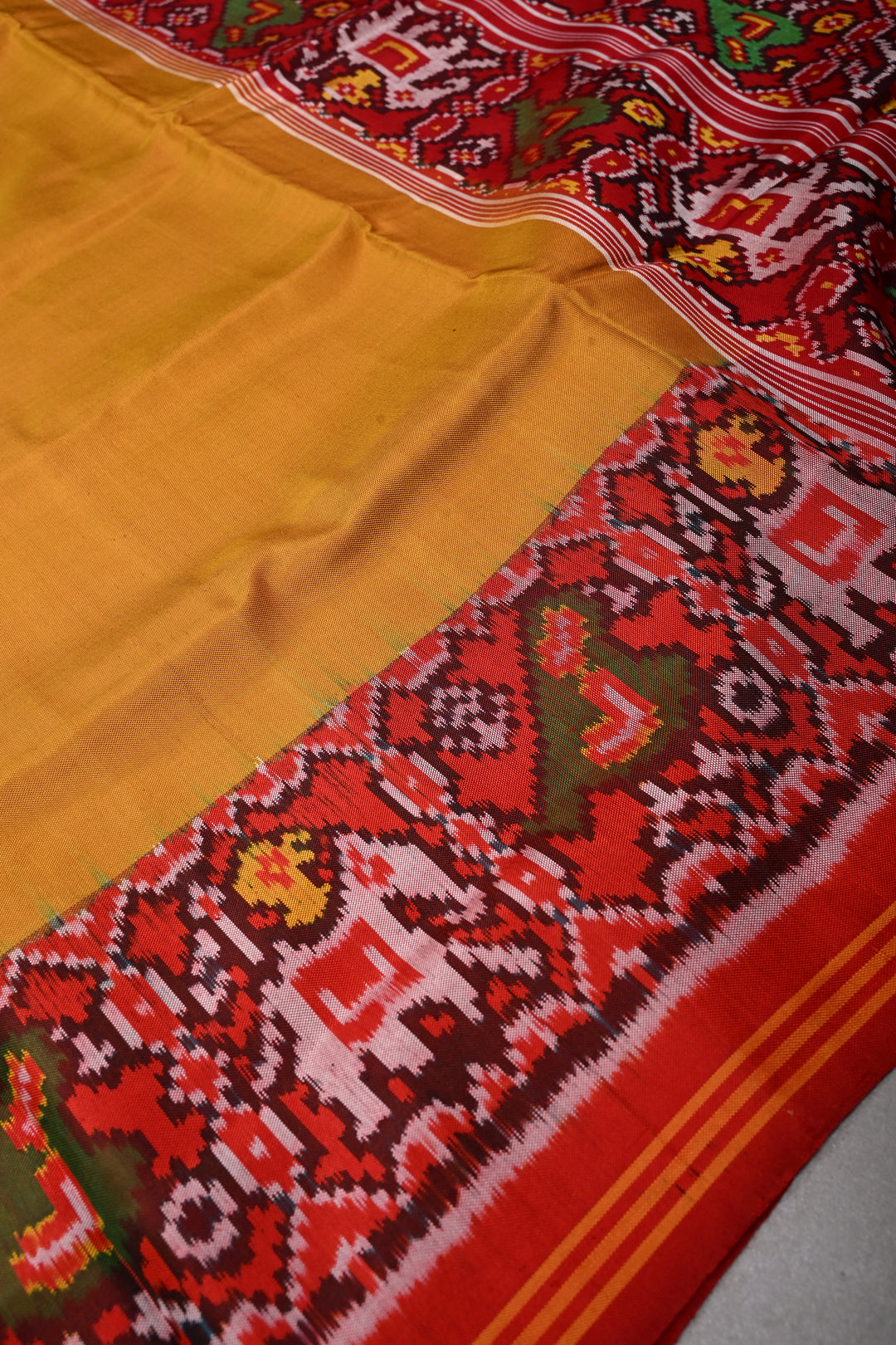 Methi Yellow Authnetic Patan Patola Singlke Ikkat Handwoven Pure Silk Saree with Heritage Borders| SILK MARK CERTIFIED | SHOBITAM