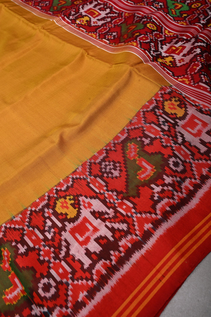 Methi Yellow Authnetic Patan Patola Singlke Ikkat Handwoven Pure Silk Saree with Heritage Borders| SILK MARK CERTIFIED | SHOBITAM