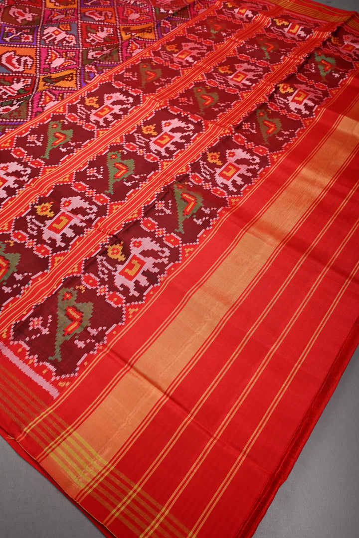 Maroon-Red Patan Patola Single Ikkat handwoven Pure Silk Saree with Geometric Motifs and Minimal Border  | SILK MARK CERTIFIED | SHOBITAM